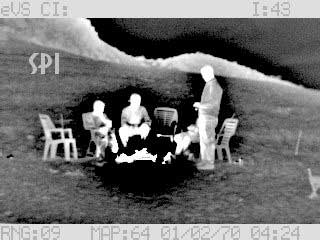 A thermal image of people taken at night