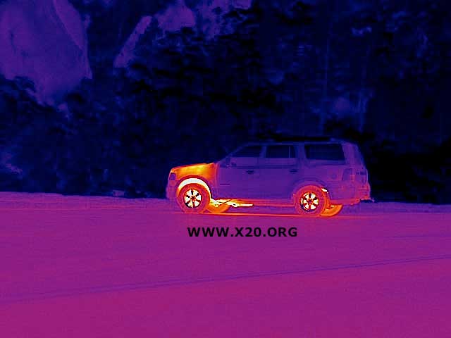 FLIR EOIR gimbal thermal image of an SUV