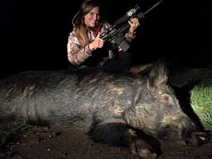 Big hog shot by a woman with an X28 thermal scope