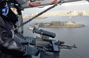 Image of US Federal Agent overlooking the statue of liberty with Thermal scope mounted