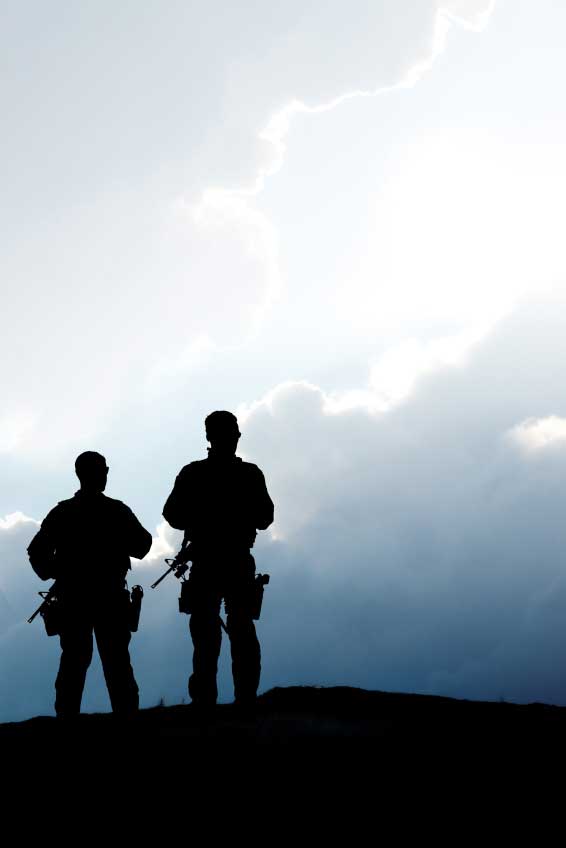 A silhouette of two soldiers with thermal rifle scopes