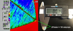 In the above image you can get a sense of the spatial resolution of the Thermal Microscope. This is an image of a standard caliper using the thermal microscope. You can see that .01mm=10 microns. The image shows the jaws of the caliper when set to .01mm. You cannot see the space with your bare eyes. Under the thermal microscope you can clearly see the space between the jaws.