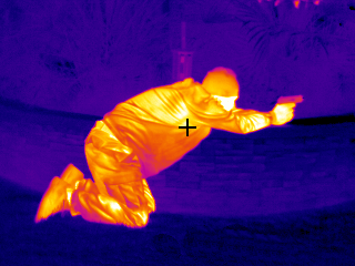 Thermal imaging for law enforcement detects an armed suspect