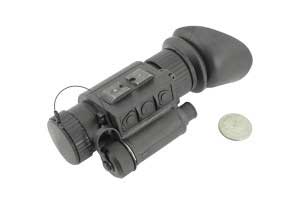 HTMI FLIR mini thermal monocular next to a quarter